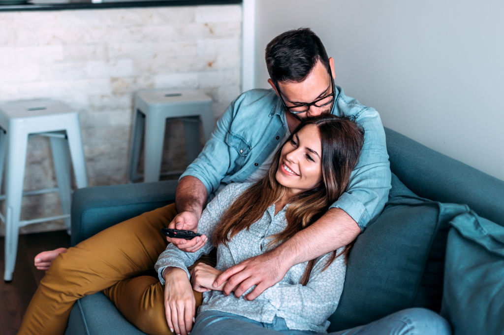 Happy couple displaying touch love language
